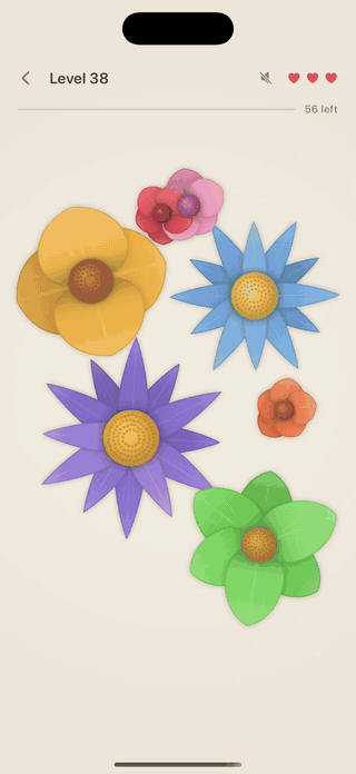 A level being cleared: a band of petals in every colour tumbles down the screen and leaves bare paper behind it.